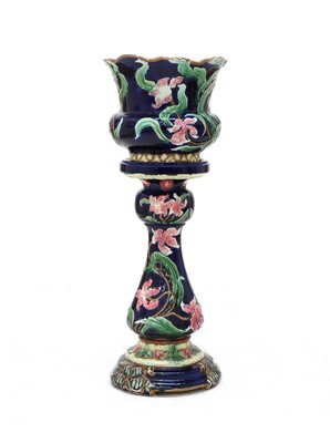 Lot 578 - A Victorian majolica jardinere on stand