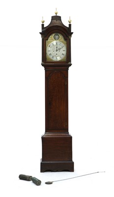 Lot 399 - An oak eight day longcase clock