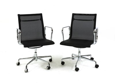 Lot 551 - A pair of mesh and chrome framed office chairs