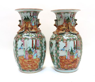 Lot 55 - A pair of Chinese Canton famille rose vases