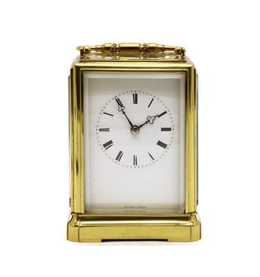 Lot 135 - A late 19th century French brass carriage clock