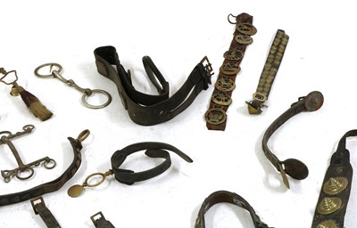 Lot 234 - A collection of brass mounted leather horse harness