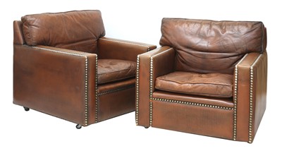 Lot 518 - A pair of leather armchairs
