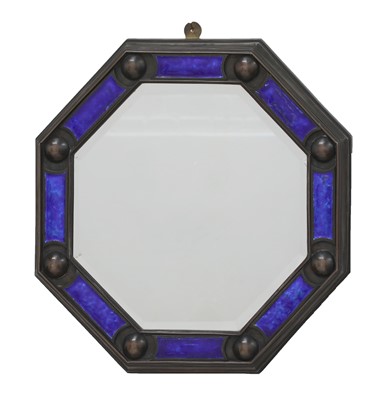Lot 154 - An Arts and Crafts cast bronze octagonal mirror