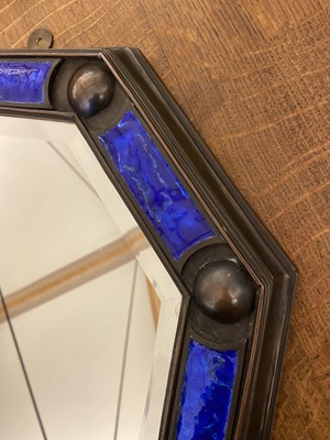 Lot 154 - An Arts and Crafts cast bronze octagonal mirror