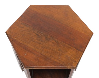 Lot 147 - A Liberty walnut hexagonal book table