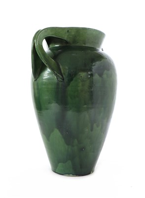 Lot 70 - A CH Brannam green glazed twin handled vase