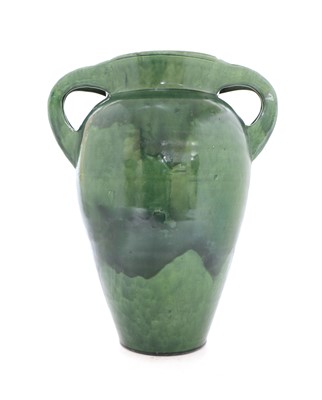 Lot 171 - A green glazed twin handled vase