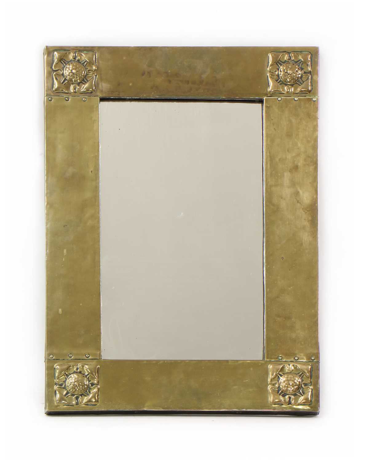 Lot 199 - A Liberty Arts and Crafts brass wall mirror