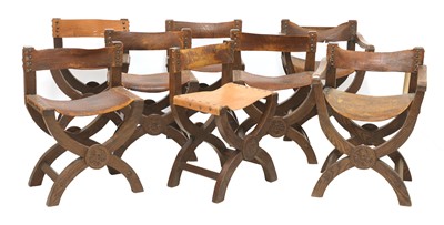 Lot 144 - A set of six 'X' framed oak chairs