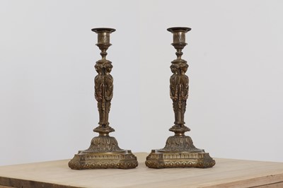 Lot 615 - A pair of cast gilt-bronze candlesticks