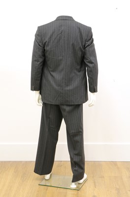 Lot 144 - A dark blue double-breasted suit