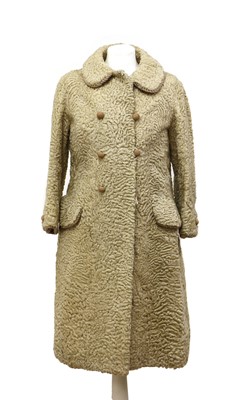 Lot 158 - A cream astrakhan full-length coat