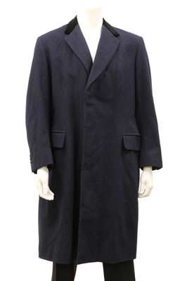 Lot 153 - A black single-breasted full-length overcoat