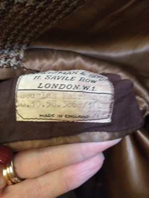 Lot 155 - A brown tweed single-breasted overcoat