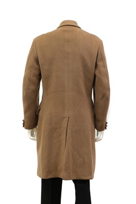 Lot 156 - A light brown double-breasted overcoat