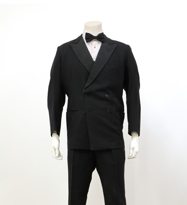 Lot 150 - A black double-breasted tuxedo