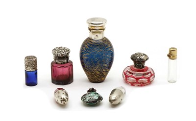 Lot 157 - A collection of glass scent bottles
