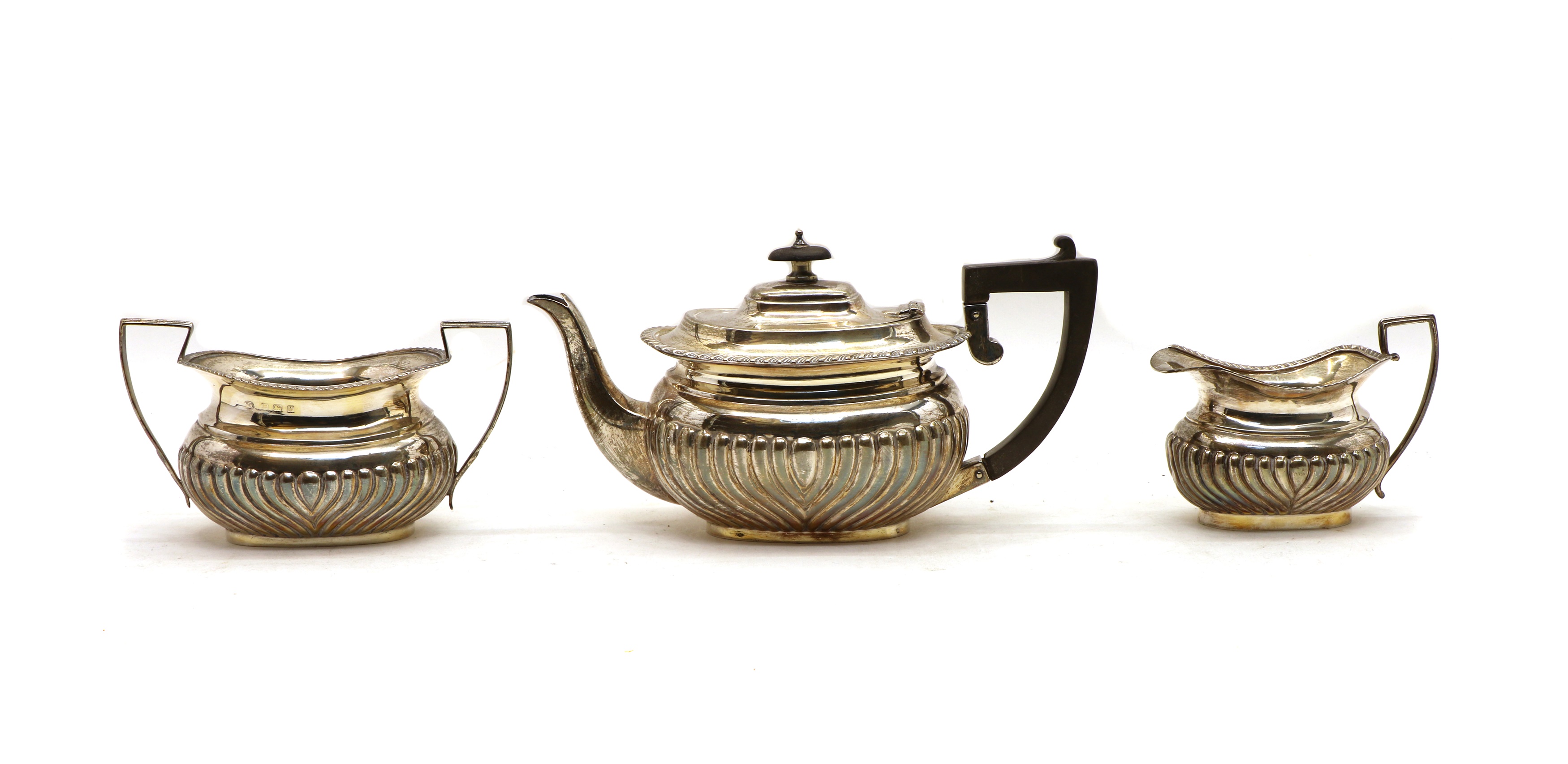 Lot 14 A composed three piece silver tea service,
