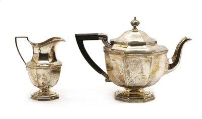 Lot 1 - A Mappin and Webb silver teapot and cream jug