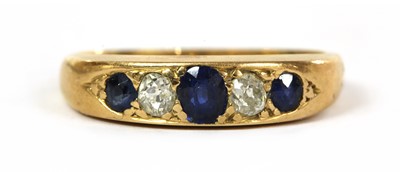 Lot 27 - A gold five stone sapphire and diamond ring