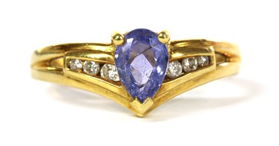 Lot 289 - An 18ct gold tanzanite and diamond ring