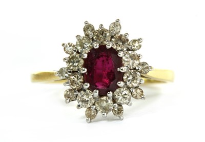 Lot 202 - An 18ct gold ruby and diamond cluster ring