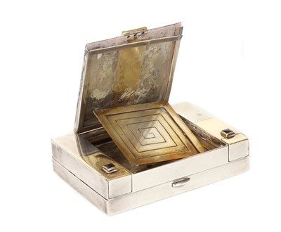 Lot 189 - An Art Deco silver and gold faced sapphire set minaudière