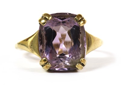 Lot 308 - A gold single stone amethyst ring