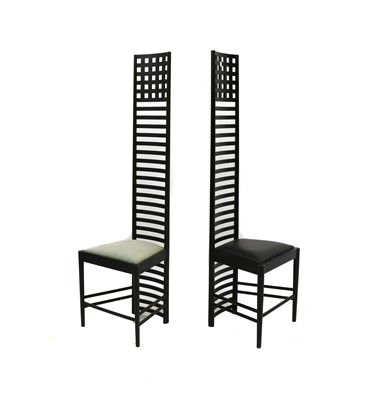 Lot 474 - A pair of black painted oak chairs