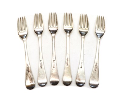 Lot 9 - A matched group of six George III silver table forks