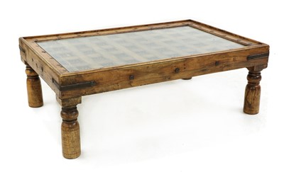 Lot 505 - An Indian hardwood coffee table
