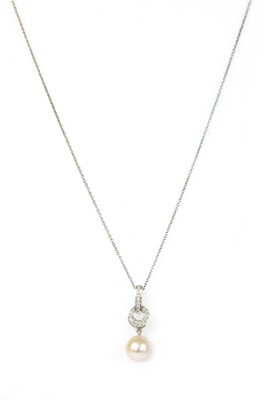 Lot 329 - A white gold cultured freshwater pearl and diamond pendant