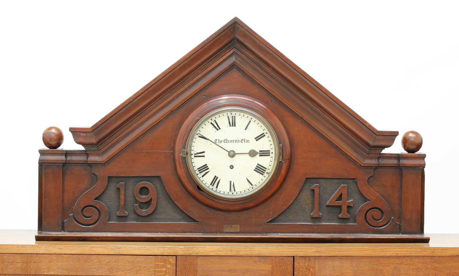 Lot 204 - A walnut pub clock