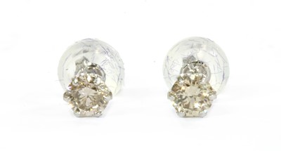 Lot 182 - A pair of single stone diamond stud earrings