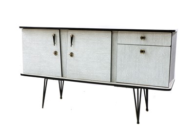 Lot 459 - An ebonised Formica sideboard