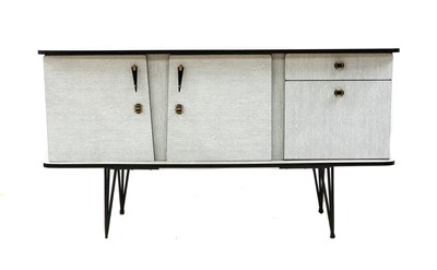 Lot 459 - An ebonised Formica sideboard
