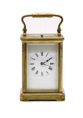 Lot 262 - A brass repeater carriage clock