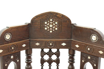Lot 151 - A Moorish mahogany armchair