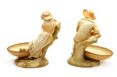 Lot 94 - A pair of Royal Worcester Hadley blush ivory porcelain figural comports