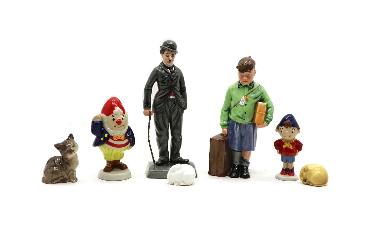 Lot 107 - A collection of porcelain figures