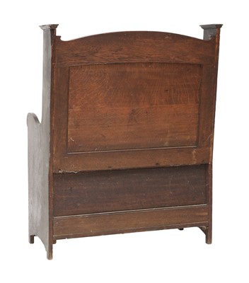Lot 142 - An Arts and Crafts oak settle