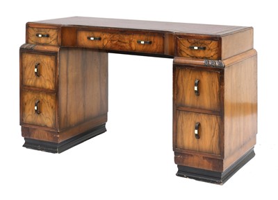 Lot 464 - An Art Deco walnut desk