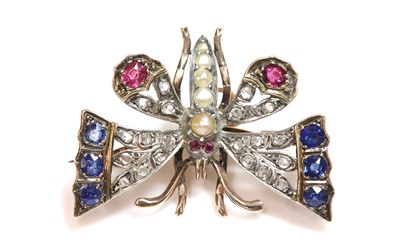 Lot 103 - A split pearl, sapphire, ruby and diamond, butterfly brooch, c.1900