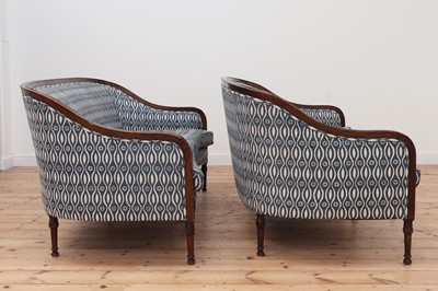 Lot 589 - A pair of George III-style mahogany-framed sofas