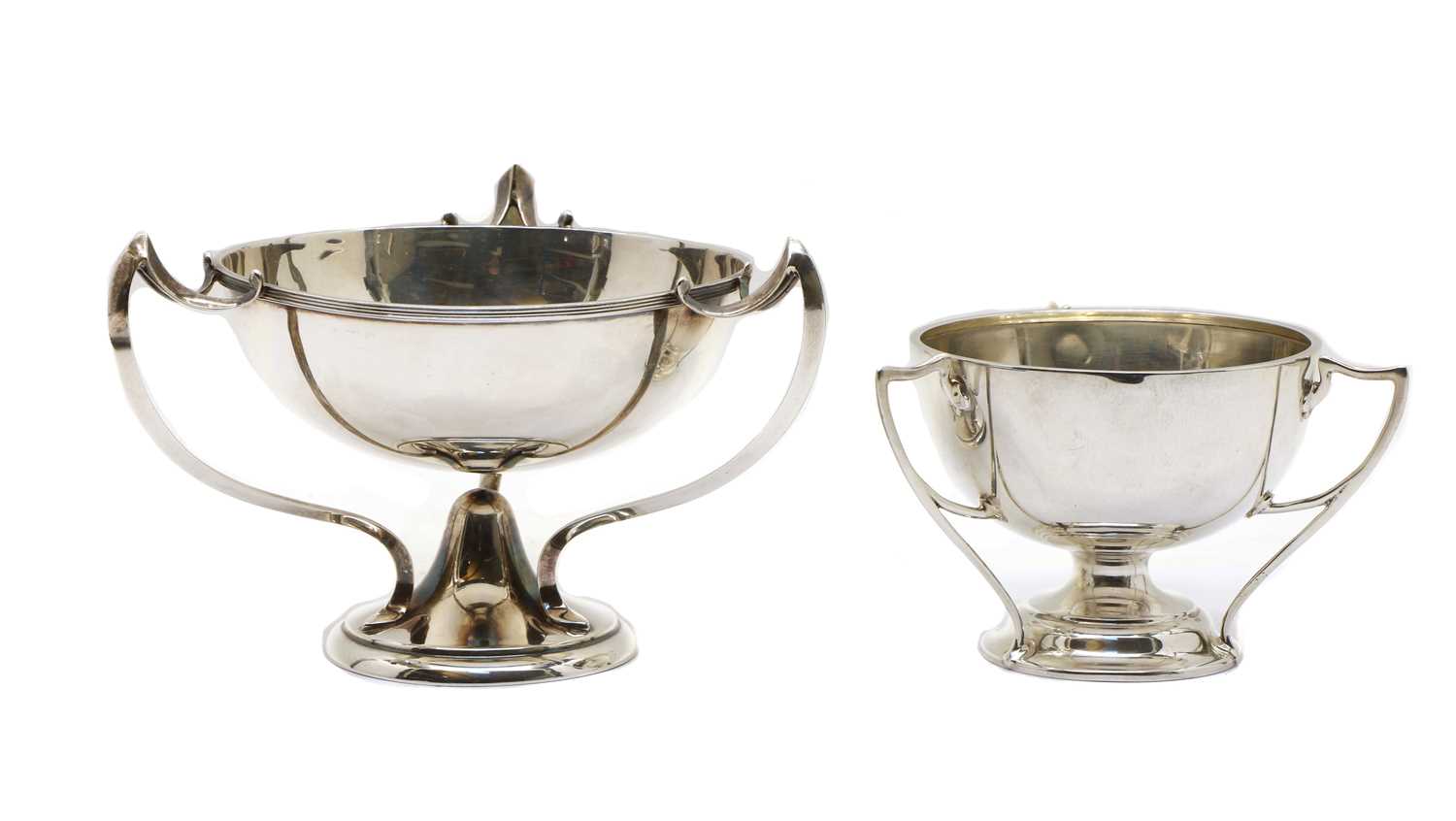 Lot 54 - An arts and crafts three handled silver bowl