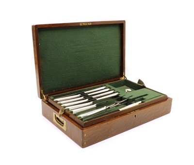 Lot 32 - A cased set of stainless steel knives by Mackay & Chisholm