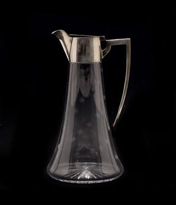 Lot 2 - An Edwardian silver mounted and cut glass claret jug