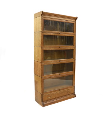 Lot 494 - A five-section oak modular bookcase