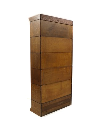 Lot 494 - A five-section oak modular bookcase